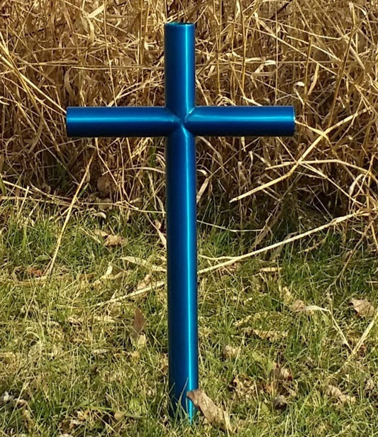 Everlasting Cross is finished in our vibrant Blue, reflecting the beauty of the sky and the warmth on a sunny day.  The small Everlasting Cross memorial is 13 inch wide by 32 inches tall and is shown in open end caps. 
 Standing tall on a roadside their memory is alive as we recall every passing moment shared together and will live forever in its resting place.